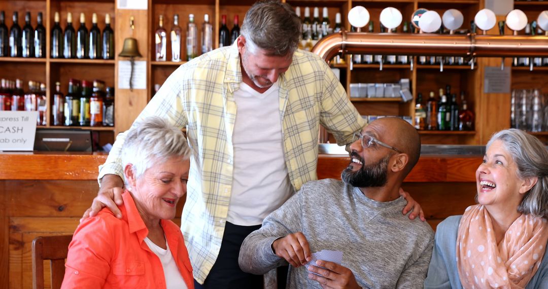 Multicultural Group Sharing Fun Game in Nearby Lounge