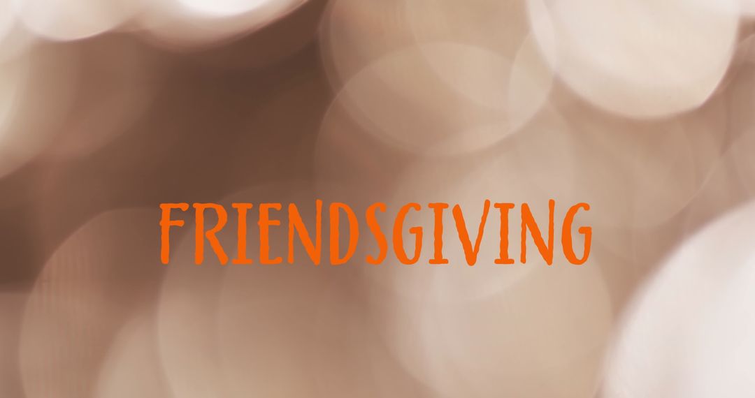 Friendsgiving Text on Warm Bokeh Background