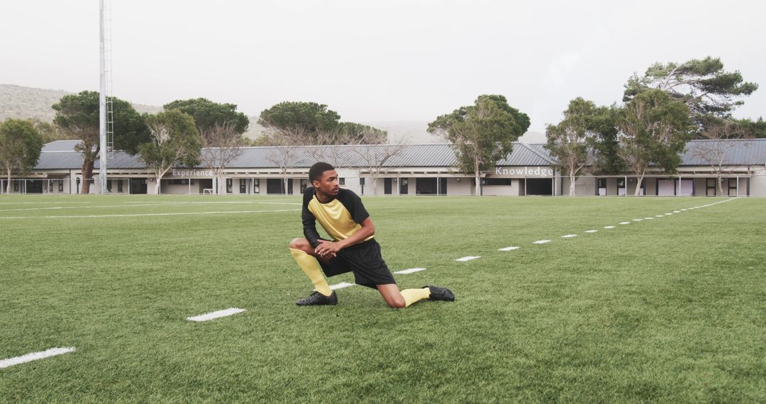 Youth Soccer Player Practicing Agility Drills on Field