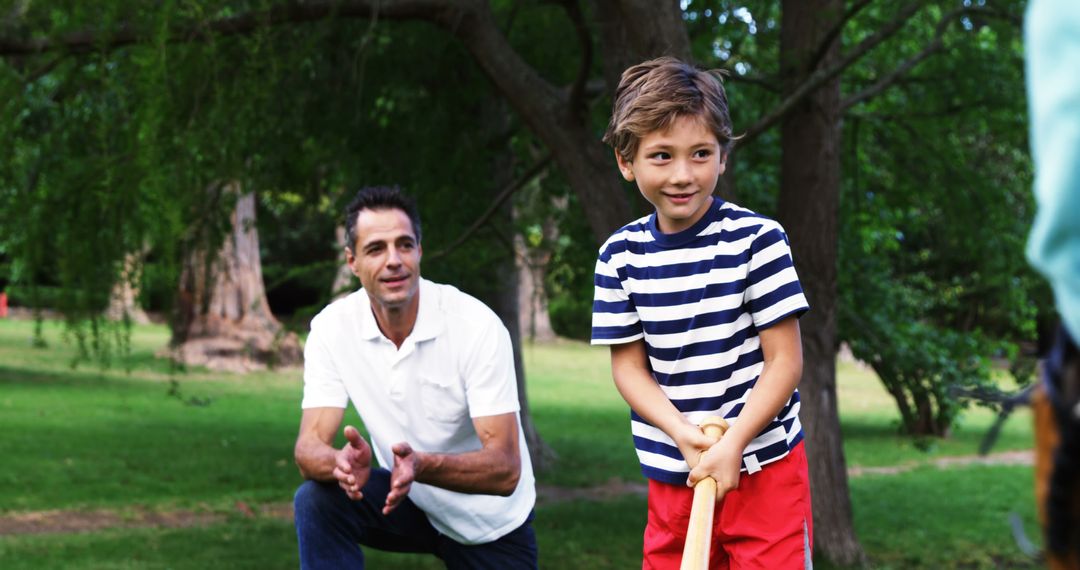 Father and Son Playing Baseball in Park - Free Images, Stock Photos and Pictures on Pikwizard.com