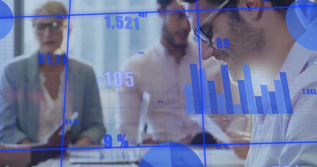 Business Professionals Analyzing Data with Overlaid Graphs and Charts - Free Images, Stock Photos and Pictures on Pikwizard.com