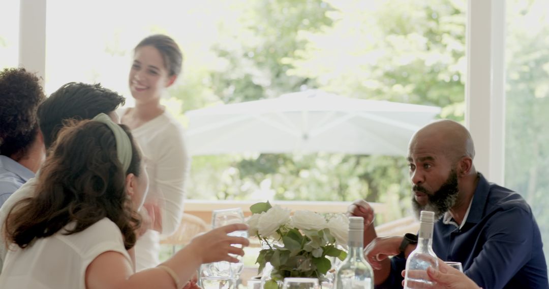 Diverse Group Enjoying Drinks at Outdoor Wedding Reception