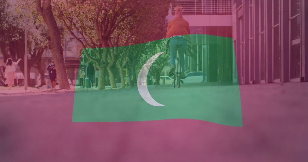 Cyclist Riding Along Urban Pathway with Flag Overlay