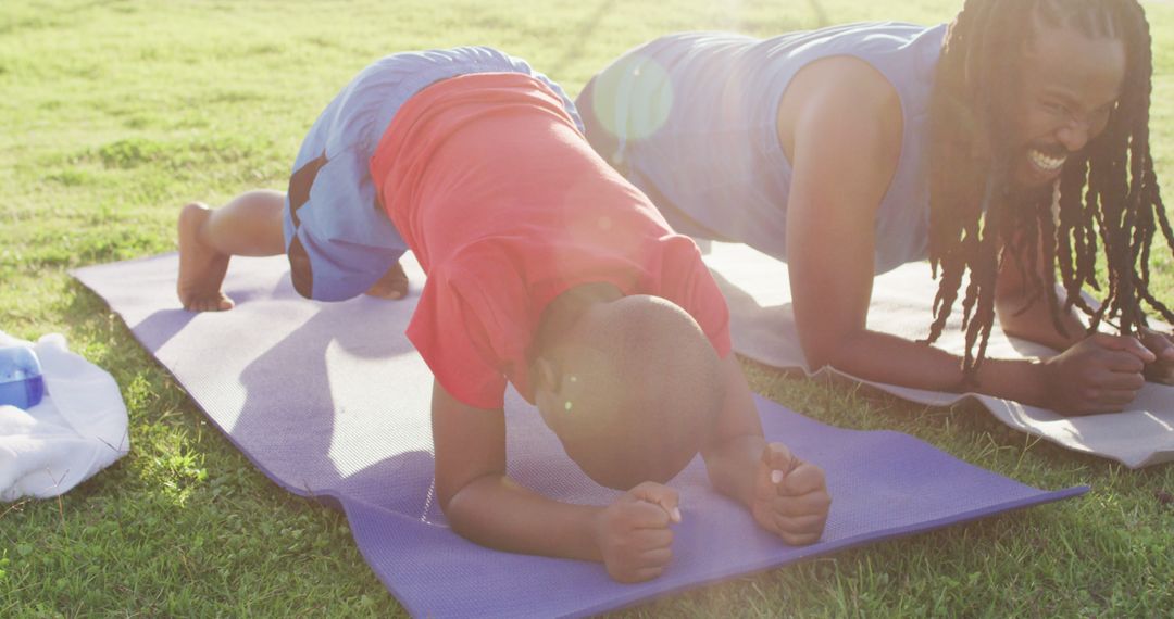 Father and Young Son Bonding by Exercising with Planks Outdoors on Sunny Day - Free Images, Stock Photos and Pictures on Pikwizard.com