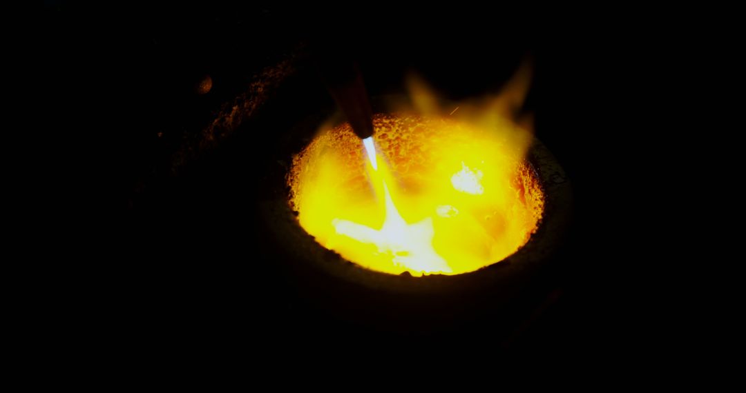 Intense Ferrous Metallurgy Scene with Molten Metal Pouring - Free Images, Stock Photos and Pictures on Pikwizard.com