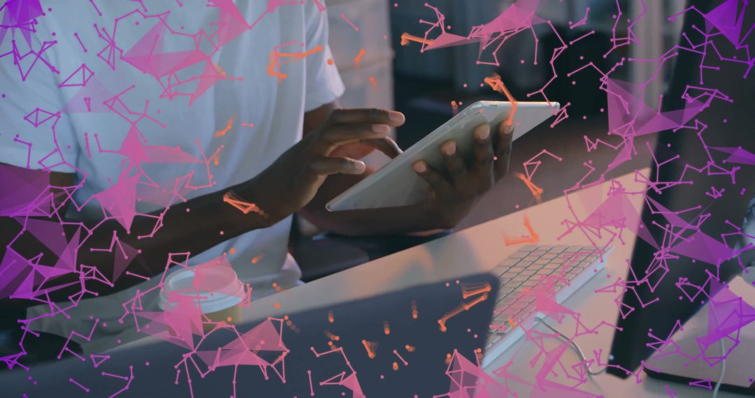Man Using Tablet at Desk with Digital Network Overlay