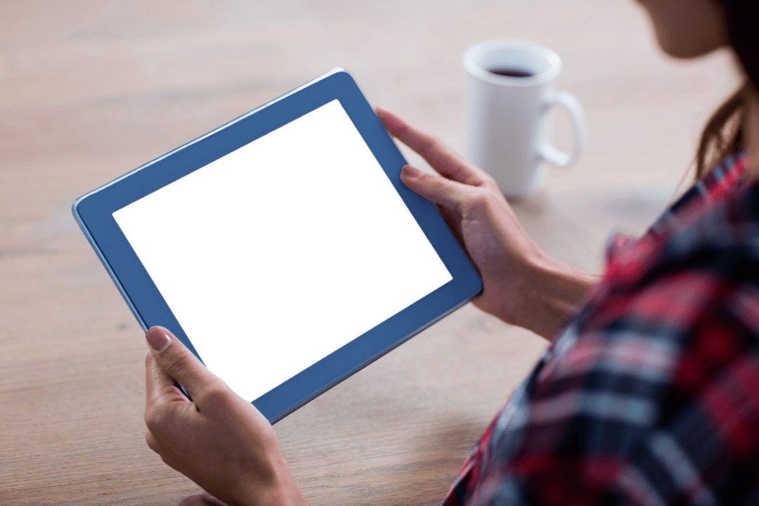 Woman Using Transparent Tablet in Casual Home Setting