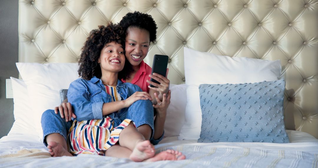 Mother and Daughter Enjoying Quality Time Taking Selfie
