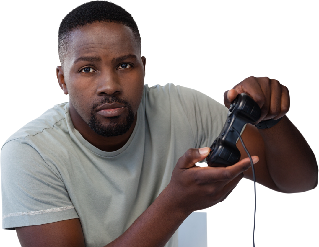 Focused Young Man Playing Video Game on Black Controller - Transparent Background - Download Free Stock Images Pikwizard.com