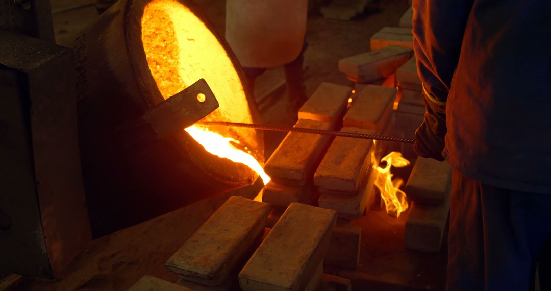 Molten Metal Pouring in Factory - Free Images, Stock Photos and Pictures on Pikwizard.com