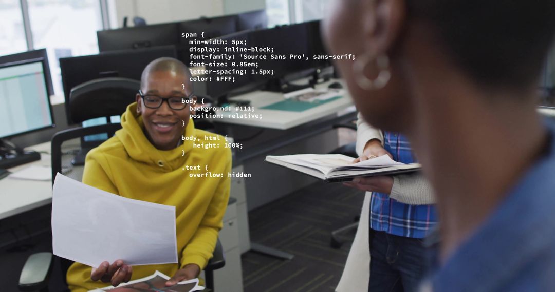 Diverse Colleagues Collaborating in High-Tech Creative Office Environment