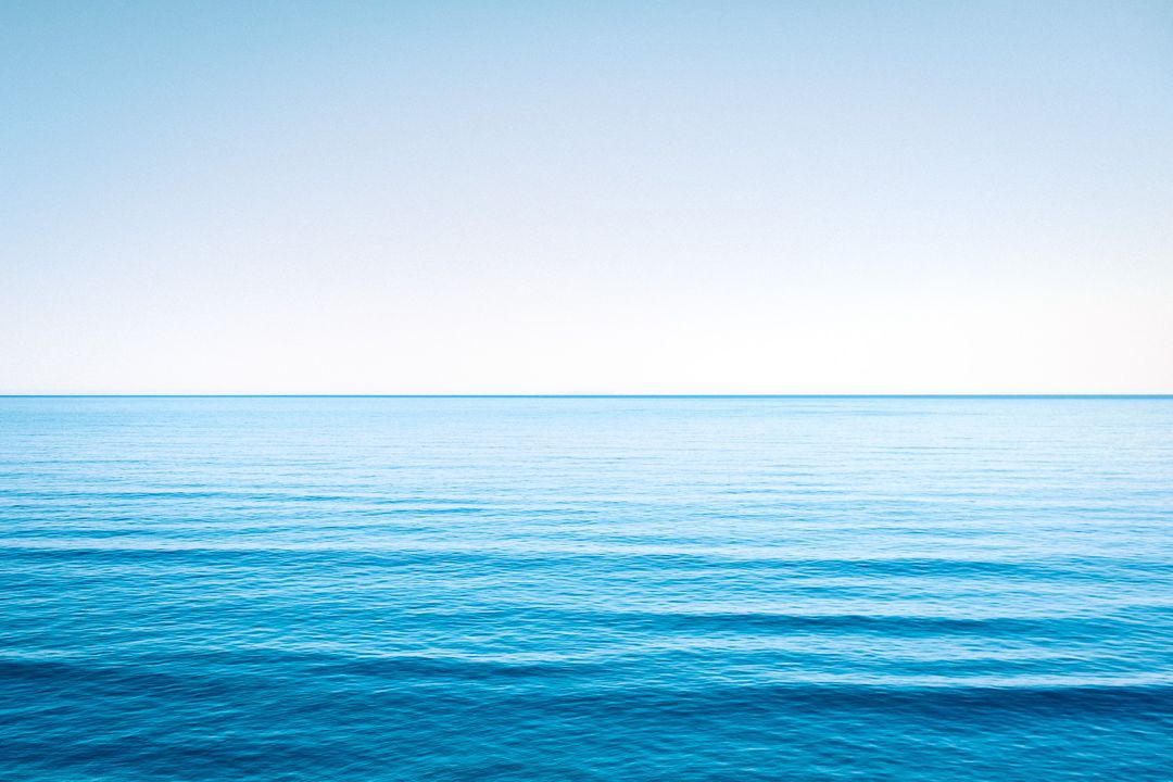 Serene Blue Ocean Horizon With Clear Sky - Free Images, Stock Photos and Pictures on Pikwizard.com