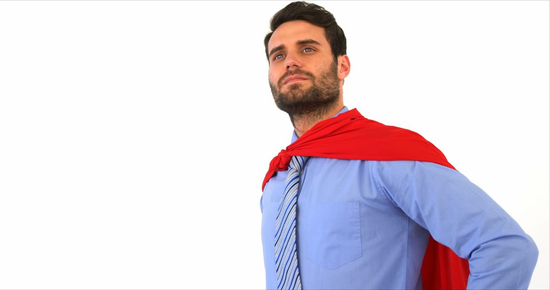 Confident Businessman Wearing Red Cape Standing Proud - Free Images, Stock Photos and Pictures on Pikwizard.com