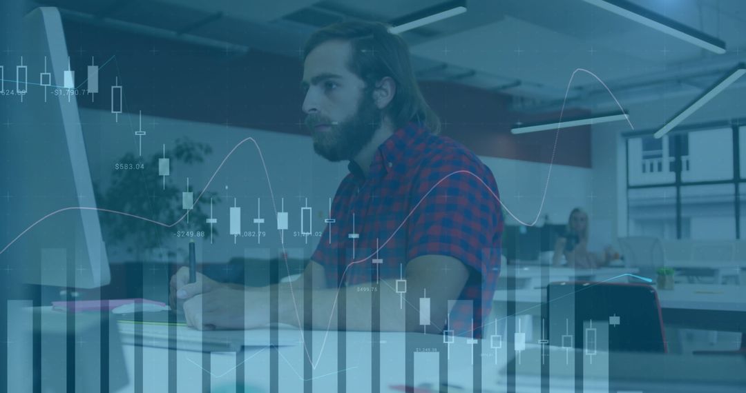Bearded Businessman Analyzing Financial Charts in Modern Office