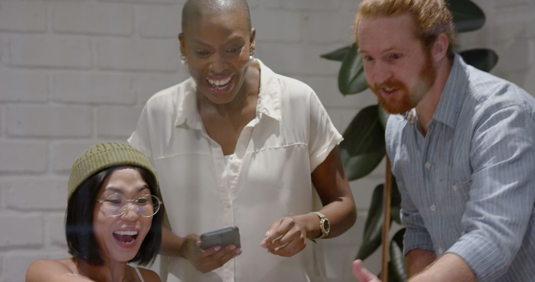 Diverse Team Collaborating on Innovative Business Project in Office