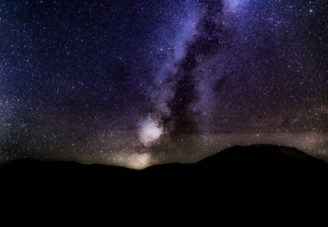 Stunning Night Sky with Milky Way Galaxy Over Dark Mountain Silhouette - Free Images, Stock Photos and Pictures on Pikwizard.com