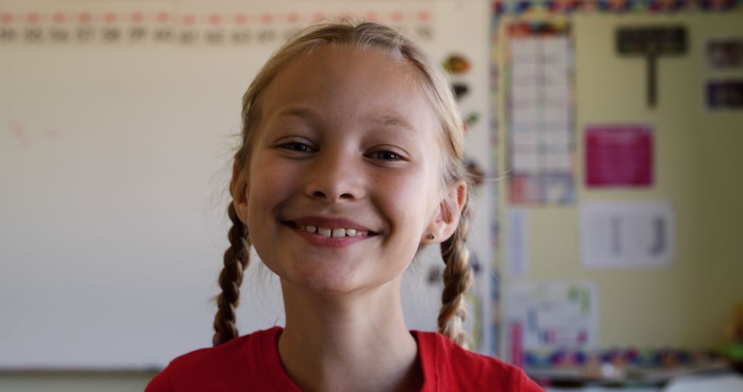 Smiling Caucasian Schoolgirl in Classroom Setting Background - Free Images, Stock Photos and Pictures on Pikwizard.com