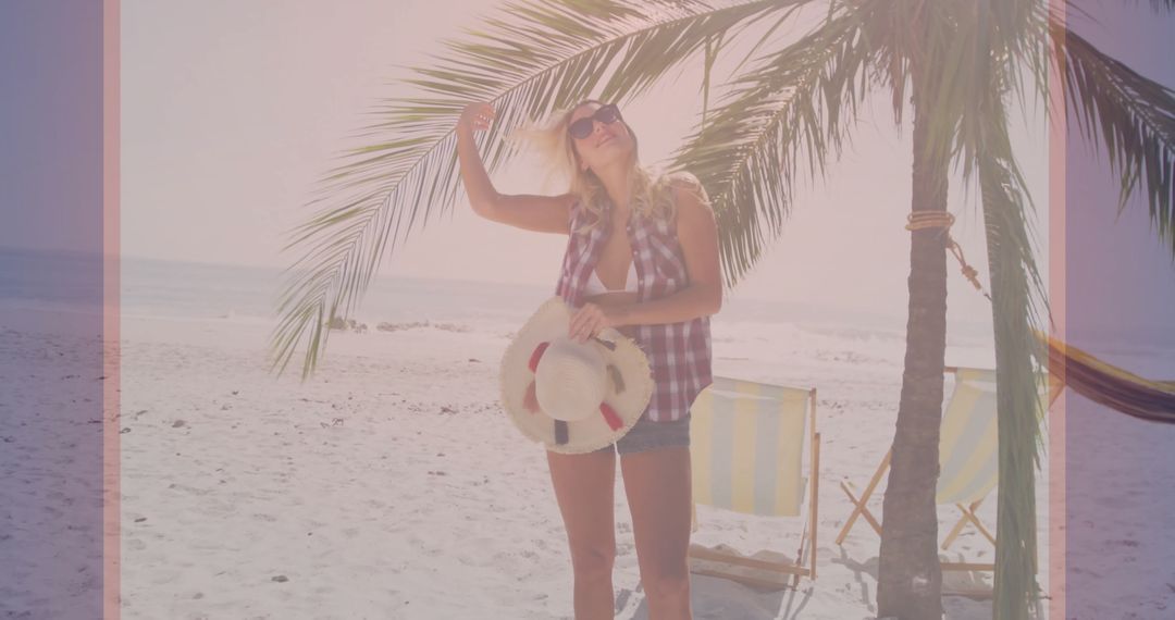 Woman Enjoying Sunny Beach Relaxation with Inflatable Ring and Palm Trees