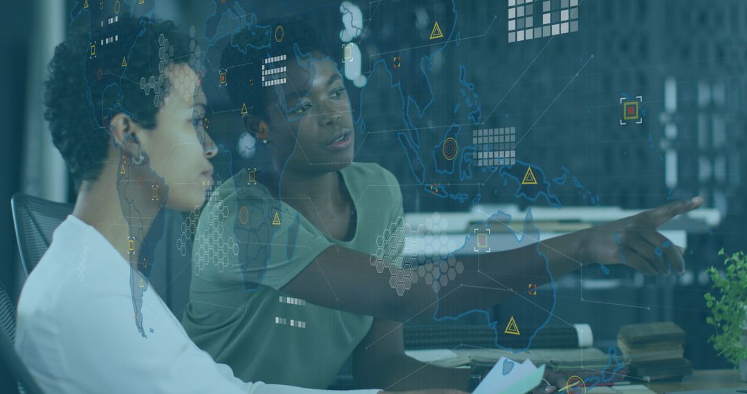 African American Businesswomen Analyzing Global Data Technology