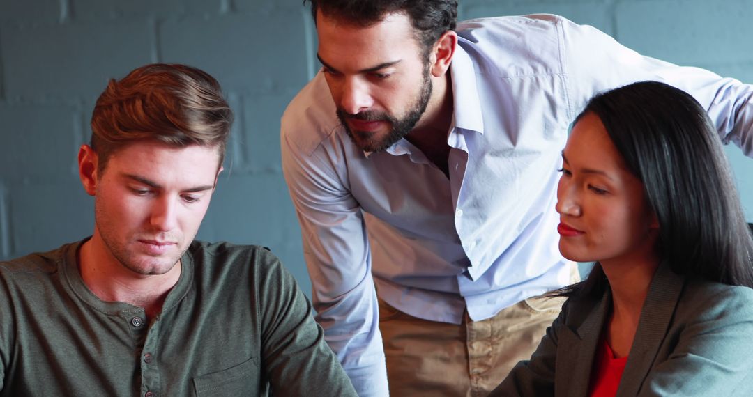 Team Collaborating on Business Project at Modern Office Workspace