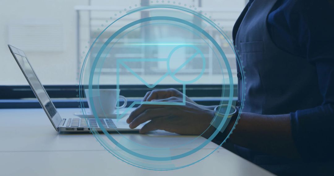 Business Person Typing on Laptop in Modern Workspace