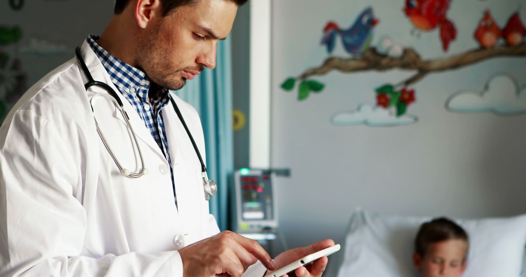 Pediatrician Using Tablet While Caring for Sick Child in Hospital Room - Free Images, Stock Photos and Pictures on Pikwizard.com