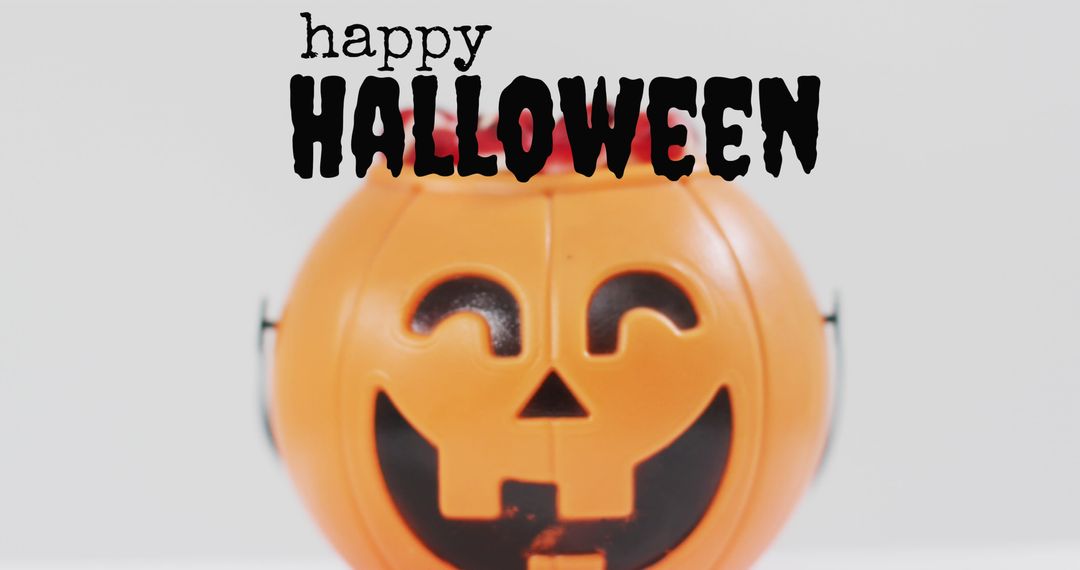 Halloween Pumpkin Bucket Overflowing with Spooky Candy