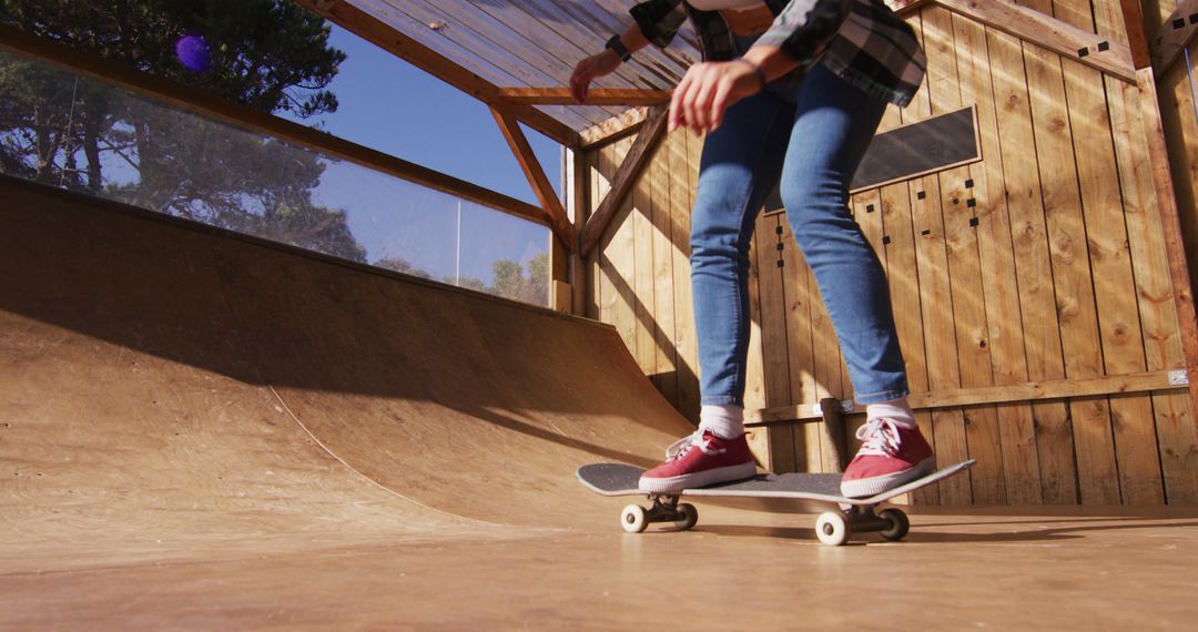 Image of legs of caucasian female skateboarder in skate park - Free Images, Stock Photos and Pictures on Pikwizard.com