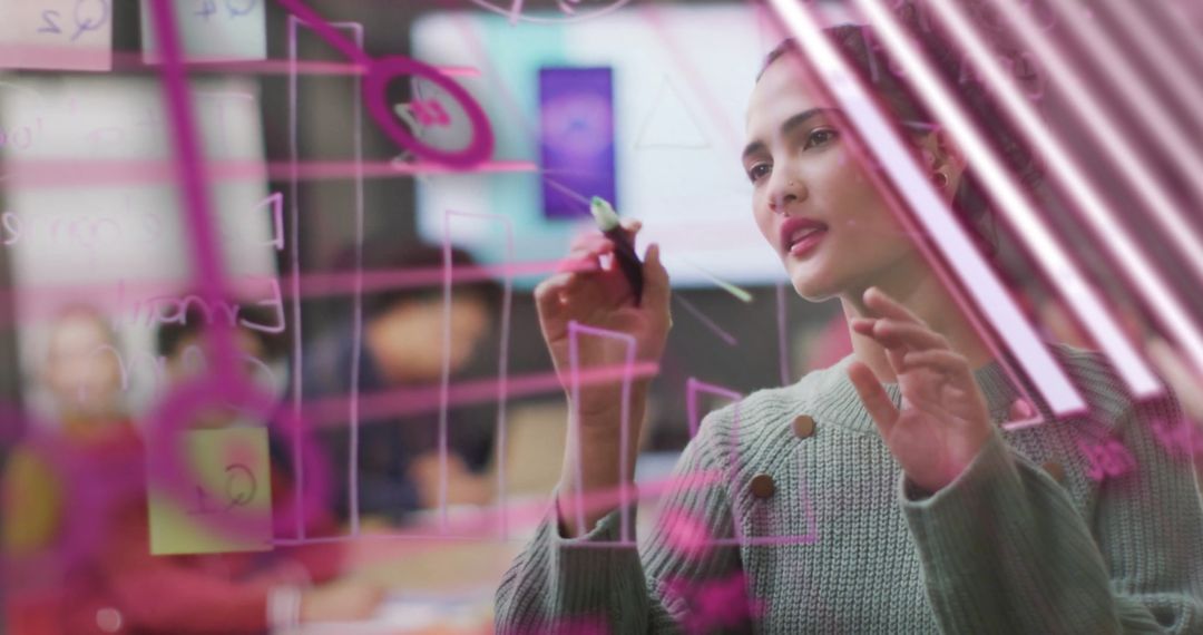Businesswoman Analyzing Digital Data on Transparent Board