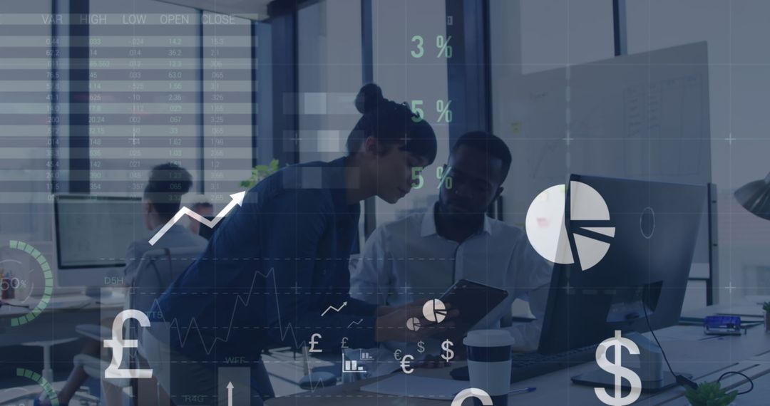 Coworkers Discussing Financial Data in Modern Office Environment