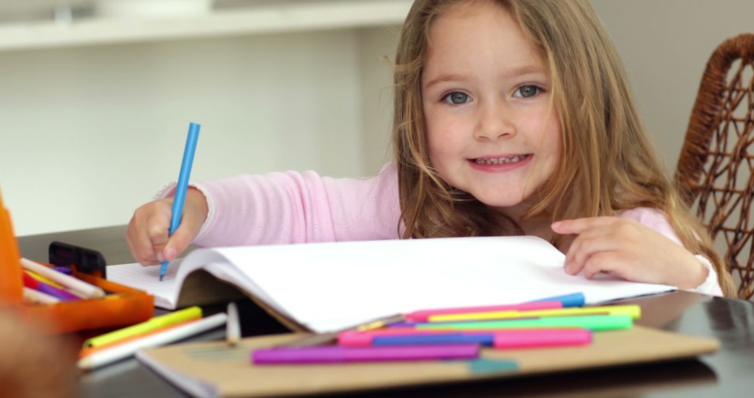 Happy Girl Drawing With Colorful Pencils at Home - Free Images, Stock Photos and Pictures on Pikwizard.com