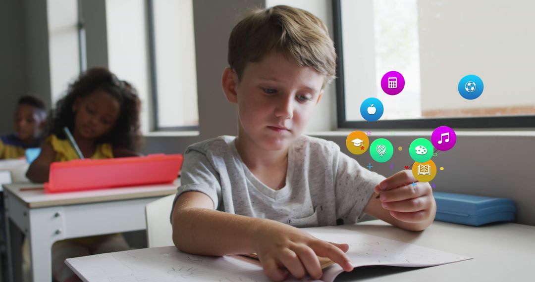 Boy Interacting with Augmented Reality Icons in Classroom - Free Images, Stock Photos and Pictures on Pikwizard.com