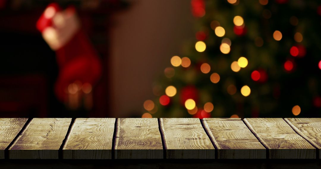 Festive Wooden Table with Blurred Christmas Tree Background