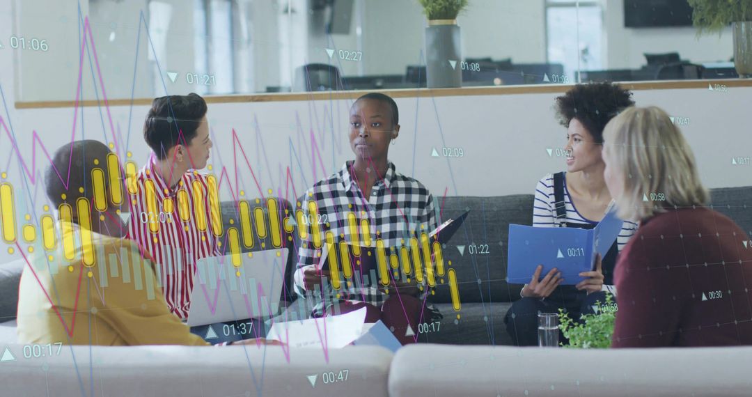 Diverse team collaborating on analytics with leader holding tablet and digital charts overlay
