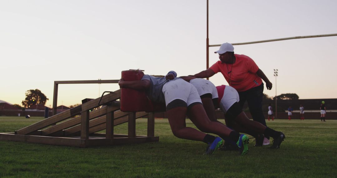 Female Rugby Training Session at Sunset - Free Images, Stock Photos and Pictures on Pikwizard.com