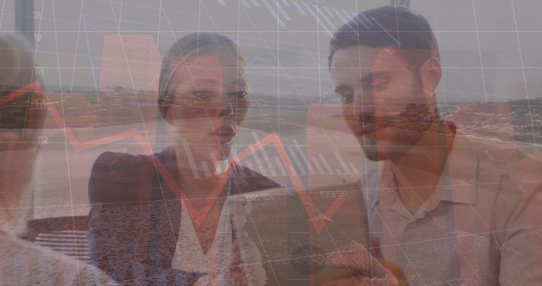 Business Team Analyzing Data Against Nature Backdrop