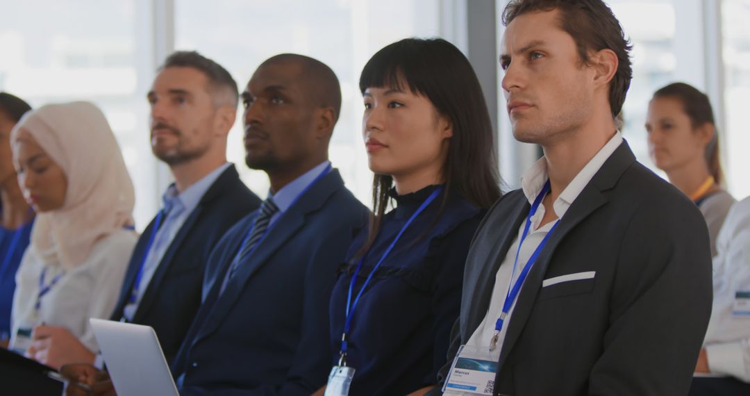 Diverse Professionals Engaged in Business Conference Meeting