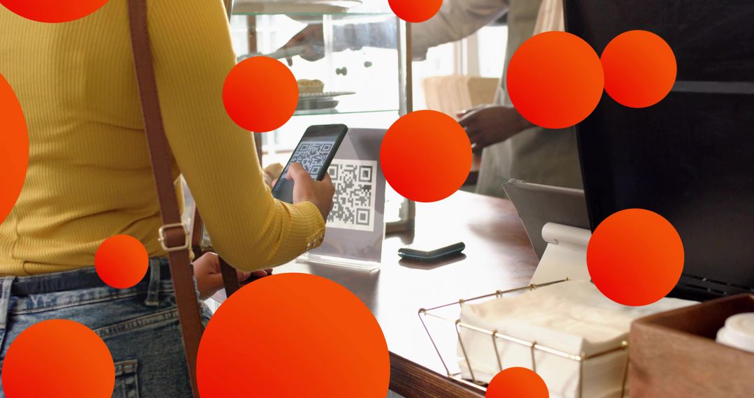 Woman in Cafe Scanning QR Code for Cashless Payment