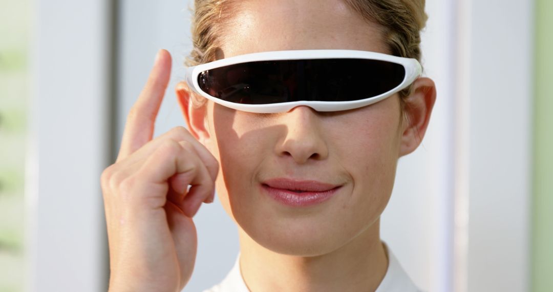 Woman Wearing Futuristic Smart Glasses - Free Images, Stock Photos and Pictures on Pikwizard.com