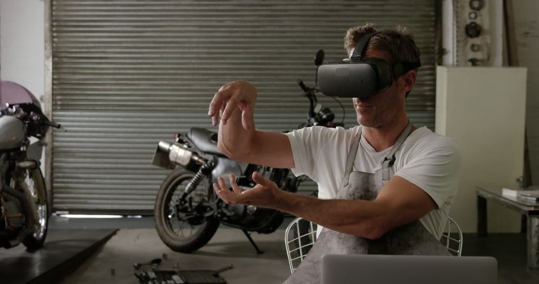 Mechanic Using Virtual Reality Goggles in Workshop - Free Images, Stock Photos and Pictures on Pikwizard.com