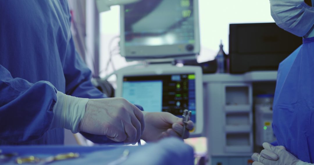 Close-Up of Surgeons Performing Surgical Procedure in Operating Room - Free Images, Stock Photos and Pictures on Pikwizard.com