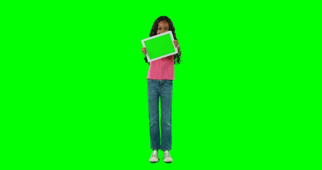 Girl Holding Tablet with Green Screen Background - Free Images, Stock Photos and Pictures on Pikwizard.com