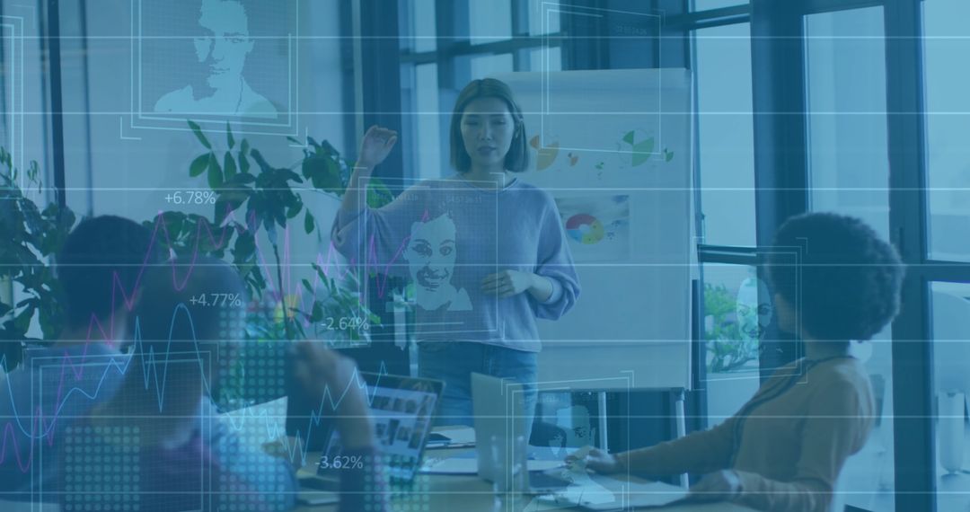 Business Professionals Discussing Financial Graphs in Modern Office