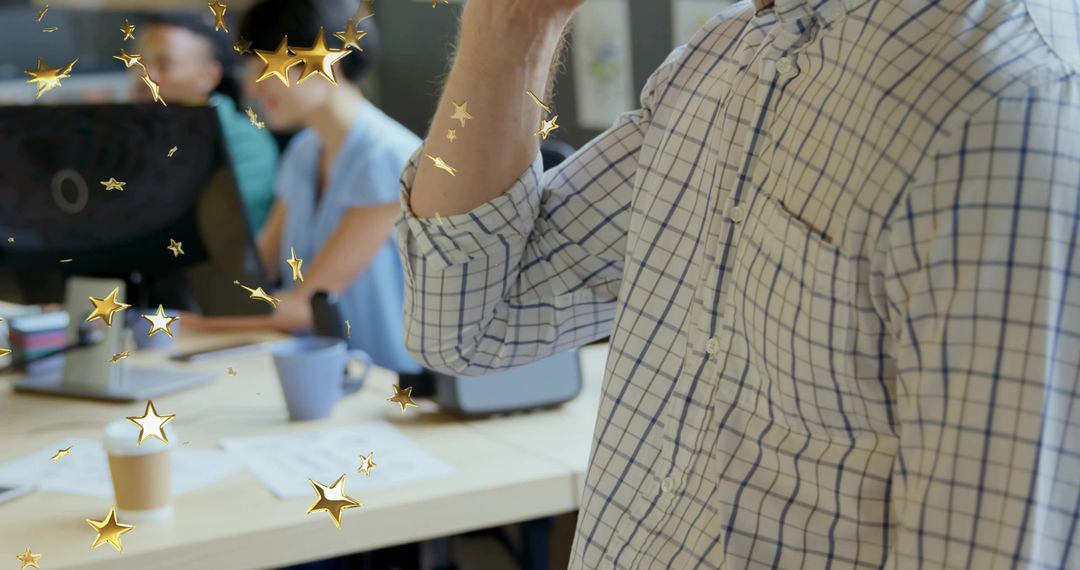 Business Professional Engaged in Call with Tech Setup on Desk
