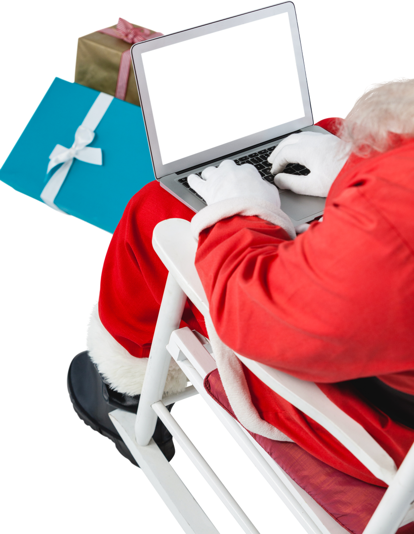 High Angle of Transparent Santa Claus Using Laptop with Gifts Nearby - Download Free Stock Images Pikwizard.com