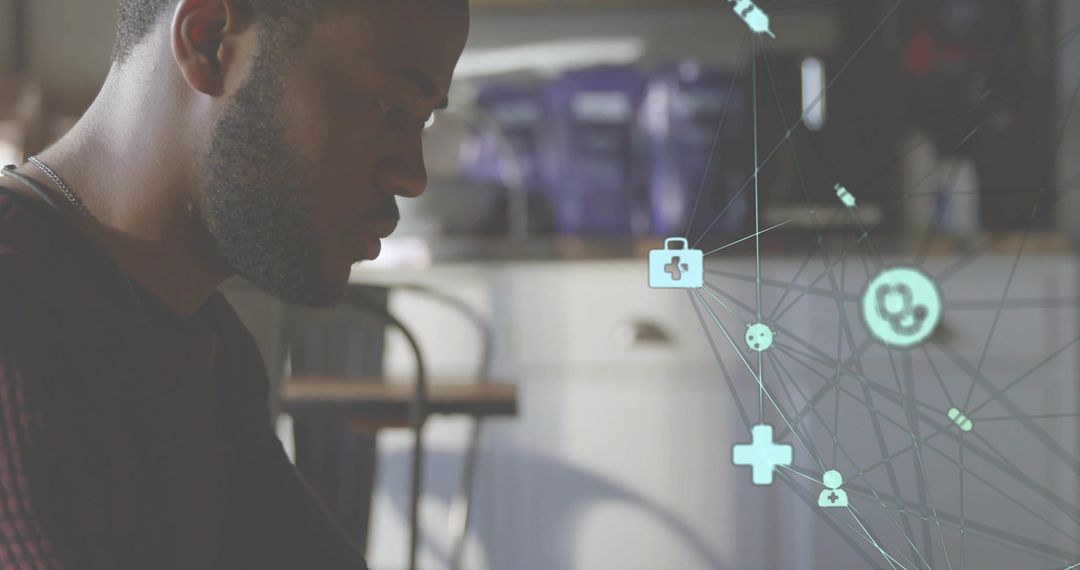 Person Analyzing Medical Technology in Modern Cafe Setting