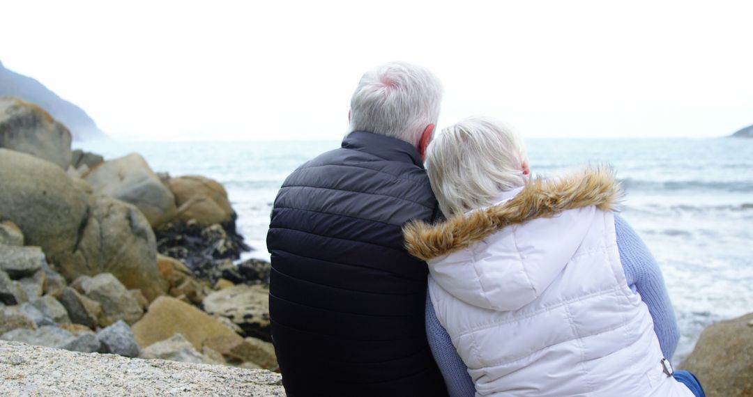 Senior Couple Enjoying Coastal View - Free Images, Stock Photos and Pictures on Pikwizard.com