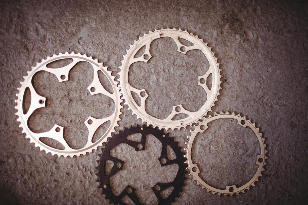 Bicycle gears on floor - Free Images, Stock Photos and Pictures on Pikwizard.com