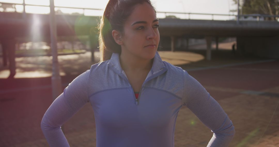 Female Athlete Preparing for Outdoor Jog at Sunrise - Free Images, Stock Photos and Pictures on Pikwizard.com