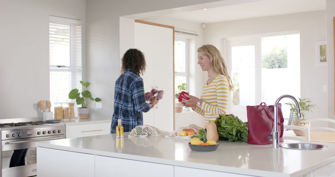 Two Women Preparing Vegetables in Modern Kitchen - Free Images, Stock Photos and Pictures on Pikwizard.com